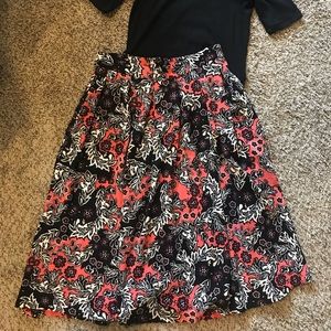 Full coral patterned midi skirt with black top